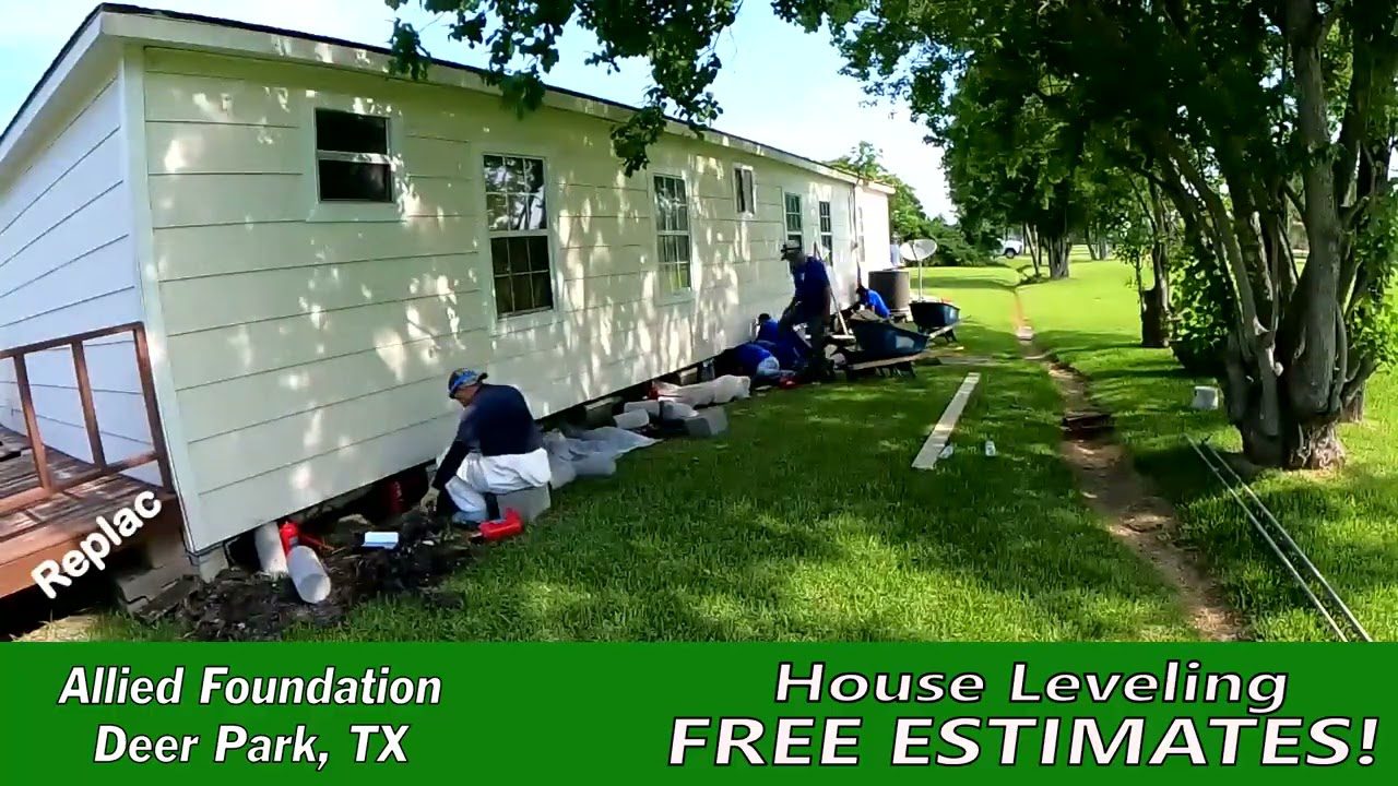 a group of people working on a house