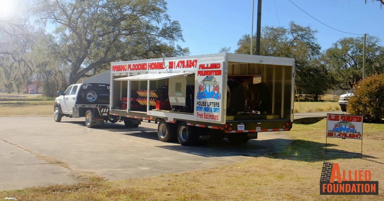 a truck with a trailer attached to the back