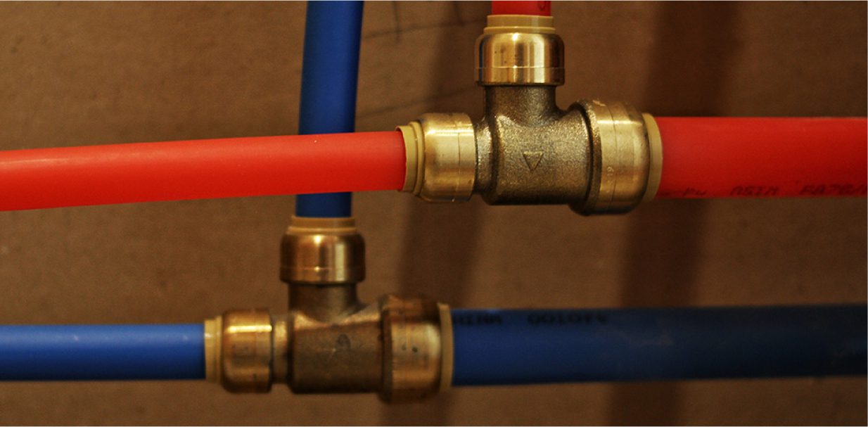 two red and blue pipes connected to each other