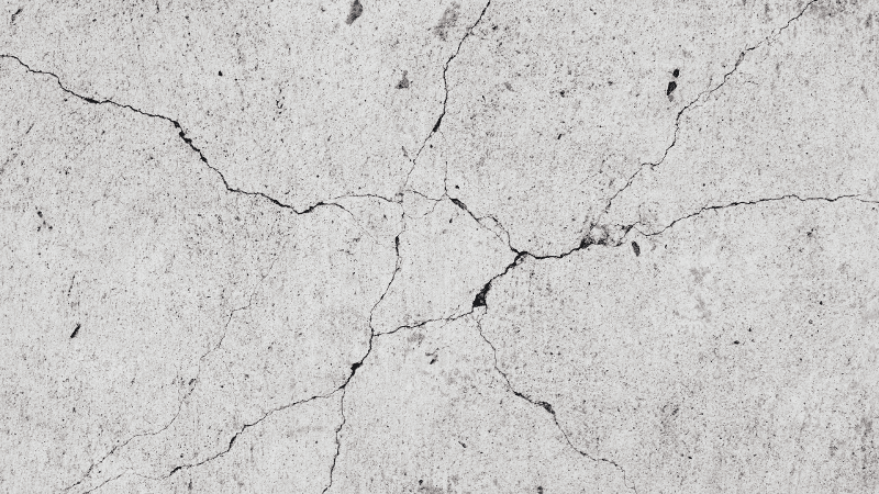 a white marble surface with cracks in it