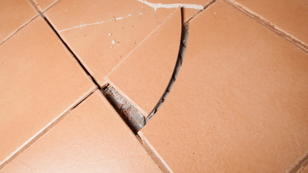 a crack in the floor shows that it is broken